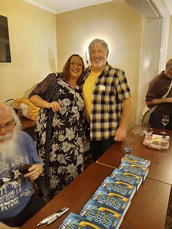 Cath and Paul Finch at Never Seen Again signing in aid of Ukraine