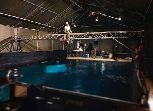 Behind the scenes shot - man on crane