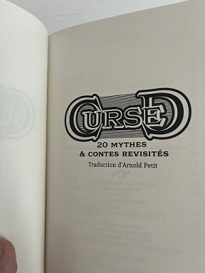 photograph of the title page of the French edition of Cursed, edited by Marie O'Regan and Paul Kane