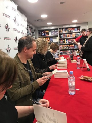 Front to back: Marie O'Regan, James Brogden, Maura McHugh, Jen Williams, signing copies of Cursed, edited by Marie O'Regan and Paul Kane