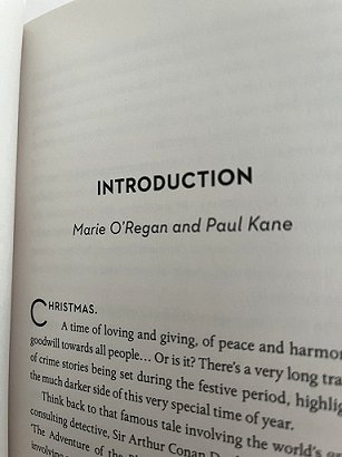 photograph showing first page of Introduction to Death Comes at Christmas, edited by Marie O'Regan and Paul Kane