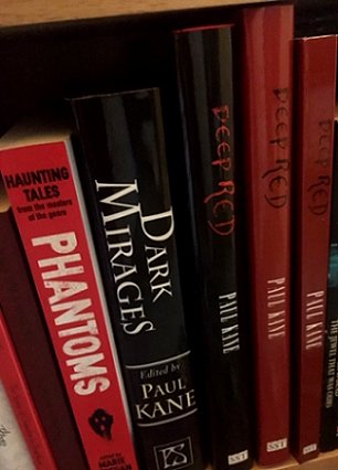 L to R: Phantoms, edited by Marie O'Regan, Dark Mirages by Paul Kane, various editions of Deep RED by Paul Kane
