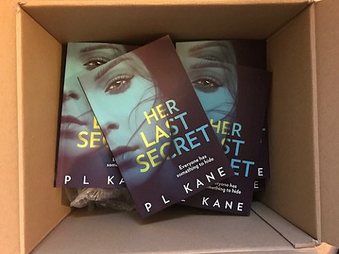 Contributor copies of Her Last Secret, by PL Kane