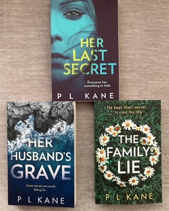 Display of three books by P L Kane - Her Last Secret, Her Husband's Grave, The Family Lie