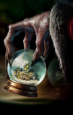 image showing Krampus' hand holding a snowglobe with a house inside