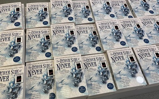 Multiple signed copies of The Other Side of Never, edited by Marie O'Regan and Paul Kane