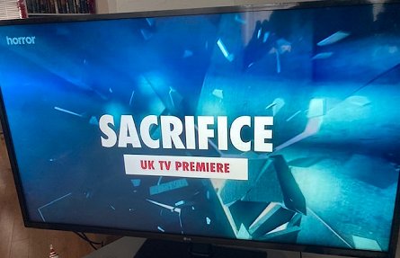 Screenshot: television showing text - horror channel - Sacrifice UK TV premier