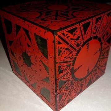 photograph of the red 'Servants' puzzlebox by Derek Neal