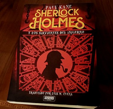 photograph of a copy of the Spanish edition of Sherlock Holmes and the Servants of Hell, by Paul Kane