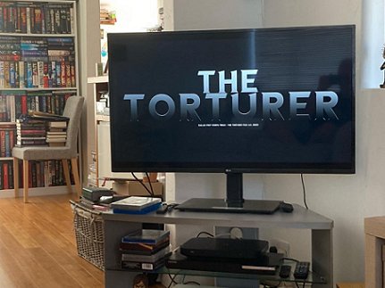 TV Screen, showing titles The Torturer