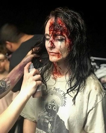 behind the scenes shot - injured woman makeup