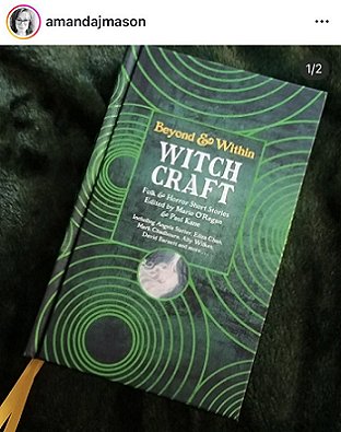 screenshot from @amandajmason. Image shows a copy of Beyond and Within Witchcraft, edited by Marie O'Regan and Paul Kane, lying on a green surface