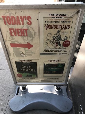 Signage for Wonderland Forbidden Planet signing