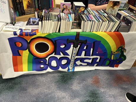 photograph showing Portal Bookshop's Dealer's table at WFC2025